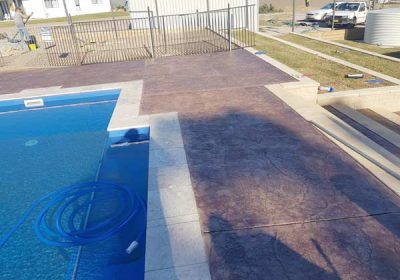 Concrete and Travertine Pool Surround