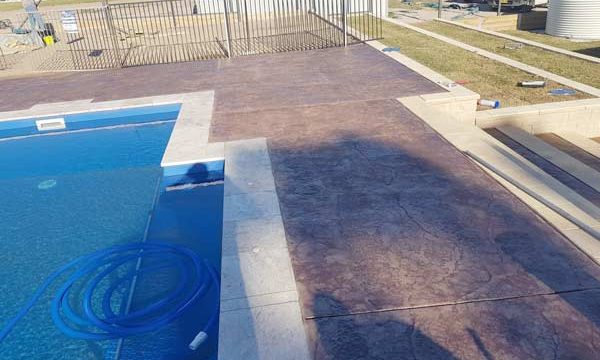 Concrete and Travertine Pool Surround