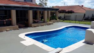 Another seamless slab to tile pool surround.