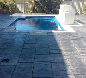 How you decide to finish your pool area can be hard. If you want less maintenance and a seamless finish then concrete is the way to go.